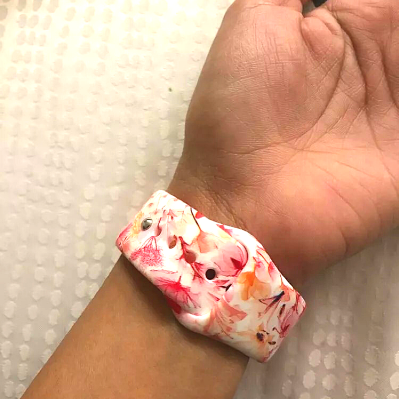 Another Closeup of Model’s Wrist, Wearing Azalea Flower Style Designer Silicone Sport Band and Apple Watch.
