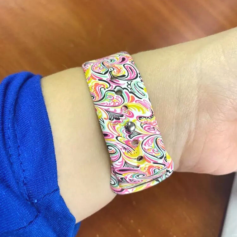 Another Closeup of Model’s Wrist, Wearing Paisely Style Designer Silicone Sport Band and Apple Watch.