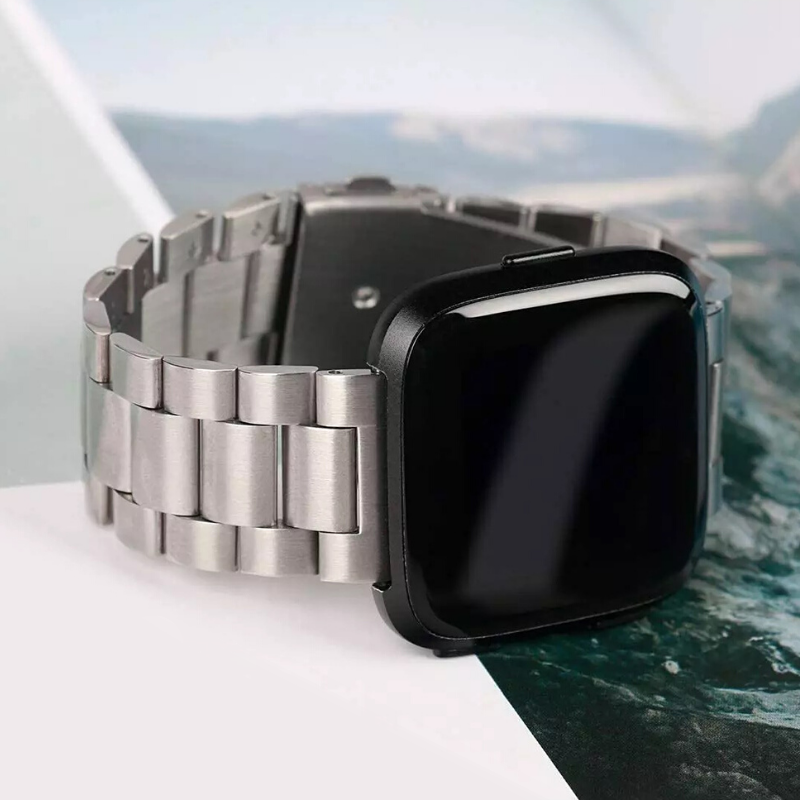 Silver Link Style Bracelet Band and Fitbit Versa on Display.