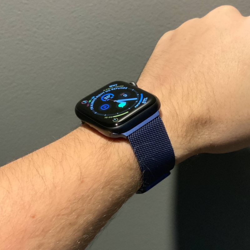 Closeup of Model's Wrist, Wearing a Blue Milanese Sport Loop Band and Apple Watch.