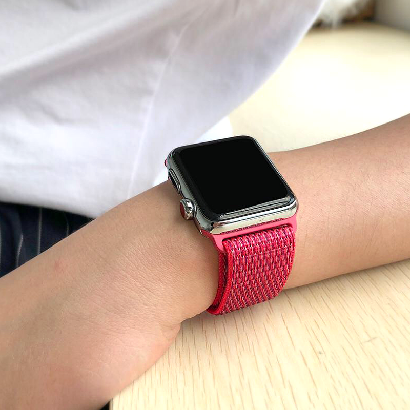 Closeup of Model's Wrist, Wearing a Hibiscus Nylon Sport Loop with Apple Watch.