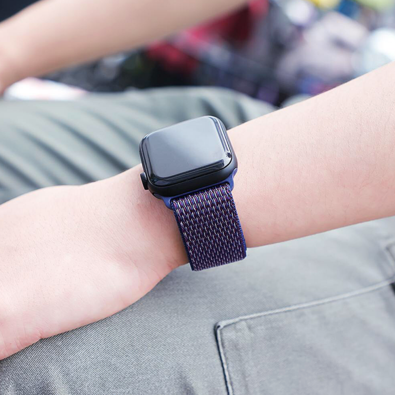 Another Closeup of Model's Wrist, Wearing an Indigo Nylon Sport Loop with Apple Watch.