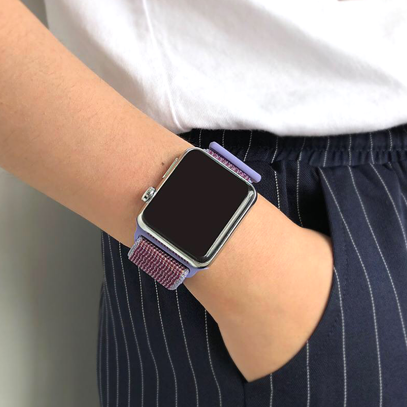 Closeup of Model's Wrist, Wearing a Lilac Purple Nylon Sport Loop with Apple Watch.