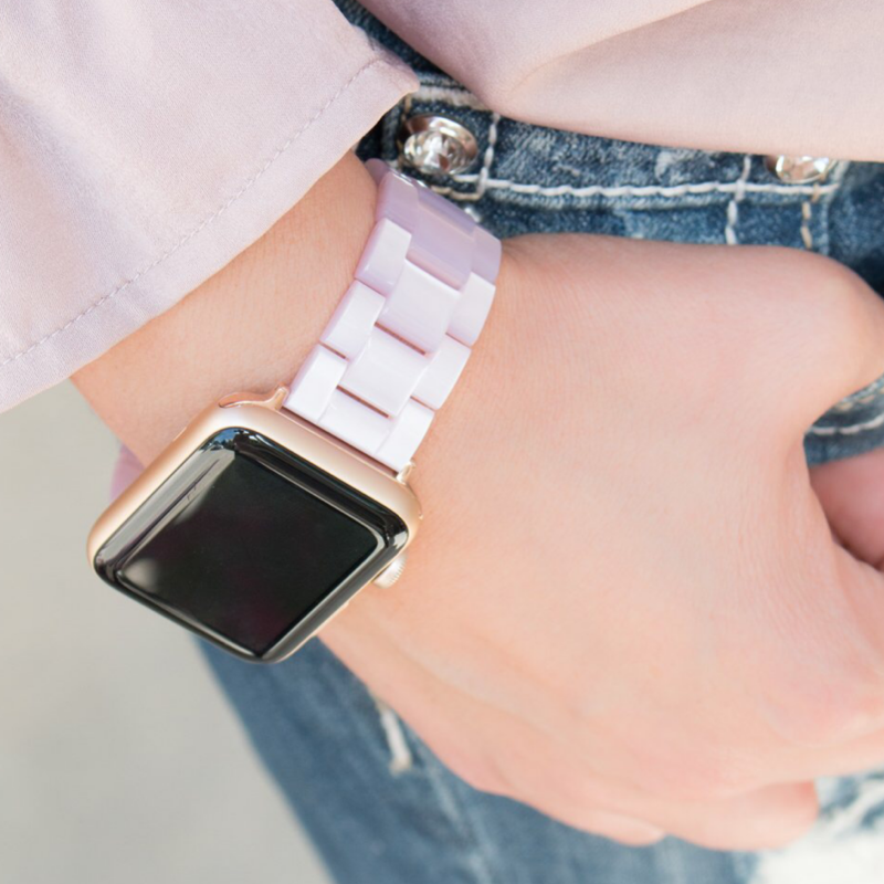 Closeup of Model's Wrist, Wearing a Barely Pink Resin Band with Apple Watch.
