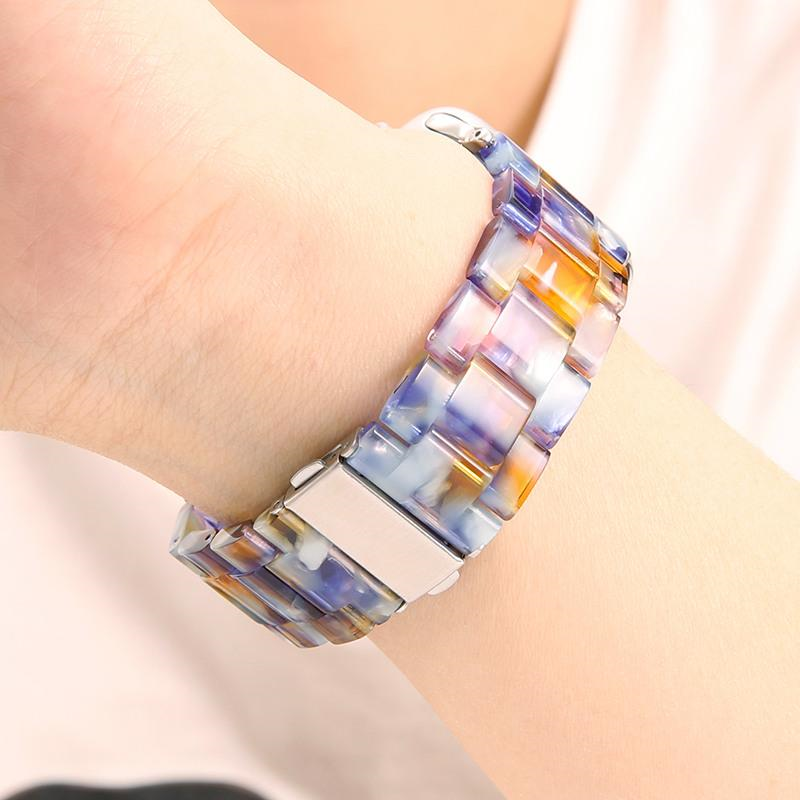 Closeup of Model's Wrist, Wearing a Blue Amber Resin Band with Apple Watch.