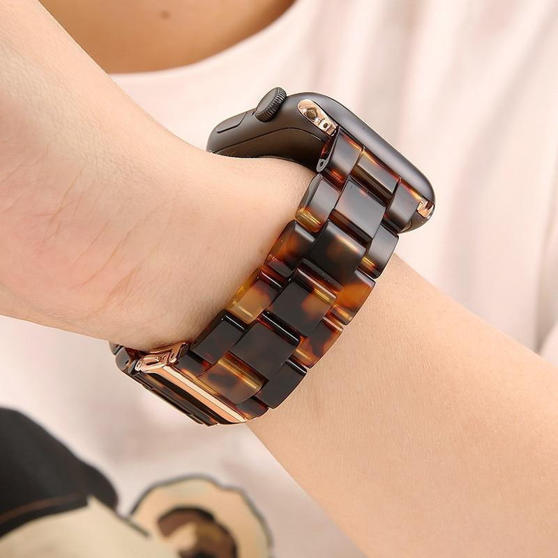 Closeup of Model's Wrist, Wearing a Tortoise Brown Resin Band with Apple Watch.