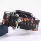 Closeup View of Black and Red Rose Flower Print Leather Band for Apple Watch.