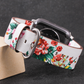 Closeup View of White and Red Rose Flower Print Leather Band for Apple Watch.
