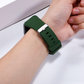 Another Closeup of Model's Wrist, Wearing a Forest Green Rugged Silicone Sport Universal Watch Band.