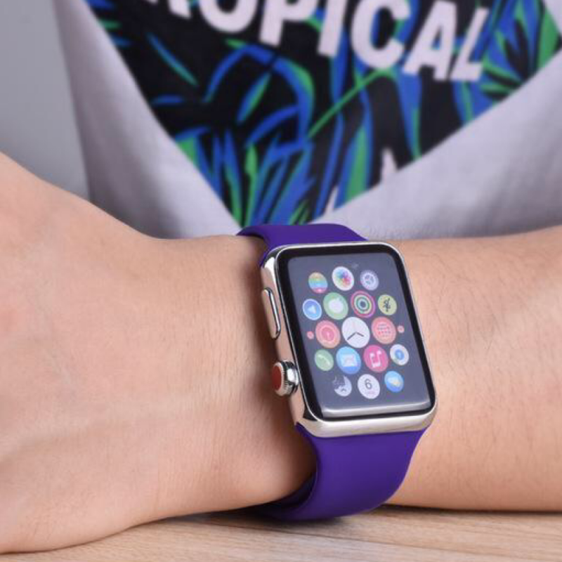 Closeup of Model’s Wrist, Wearing a Violet Purple Silicone Sport Strap and Apple Watch.