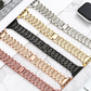 Group of Five Vintage Style Diamond Link Bracelet Apple Watch Bands in Various Color Styles Laying Flat on Display.