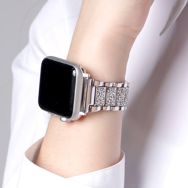 Another Closeup of a Model’s Wrist Wearing an Apple Watch with a Silver Vintage Style Diamond Link Bracelet Band. 