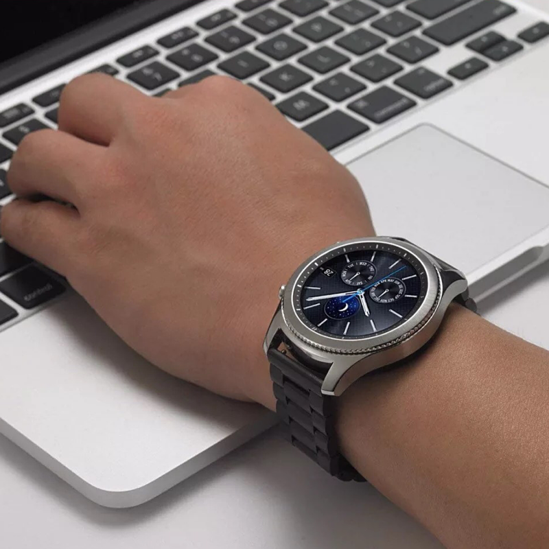 Closeup of Model's Wrist, Wearing a Samsung Gear S3 Classic with a Black Classic Link Universal Watch Band.