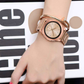 Closeup of Model's Wrist, Wearing a Samsung Galaxy Watch with a Rose Gold Classic Link Universal Watch Band.