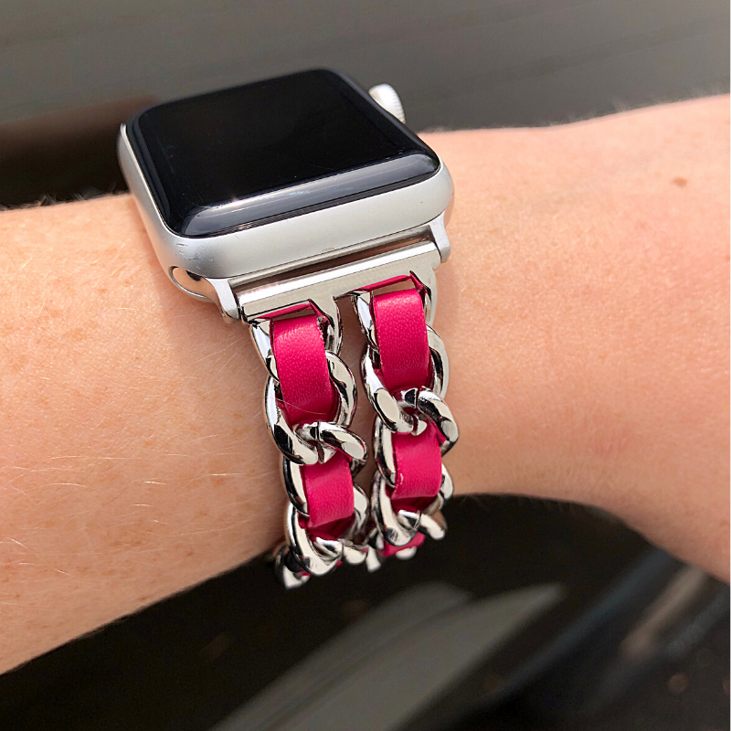 Closeup of Model's Wrist, Wearing a Silver and Magenta Dark Pink Red Leather Chain Bracelet Band and Silver Apple Watch.